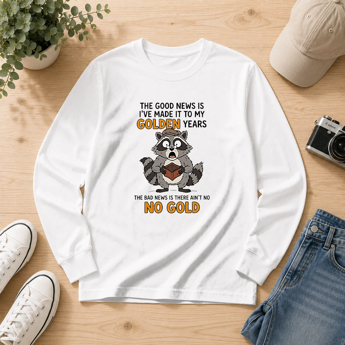 Nice Raccoon The Good News Is Ive Made It To My Golden Years The Bad News Is There Aint No No G long sleeve shirt in black, front view