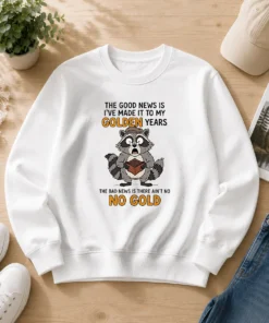 Nice Raccoon The Good News Is Ive Made It To My Golden Years The Bad News Is There Aint No No G cozy sweater with printed text on front