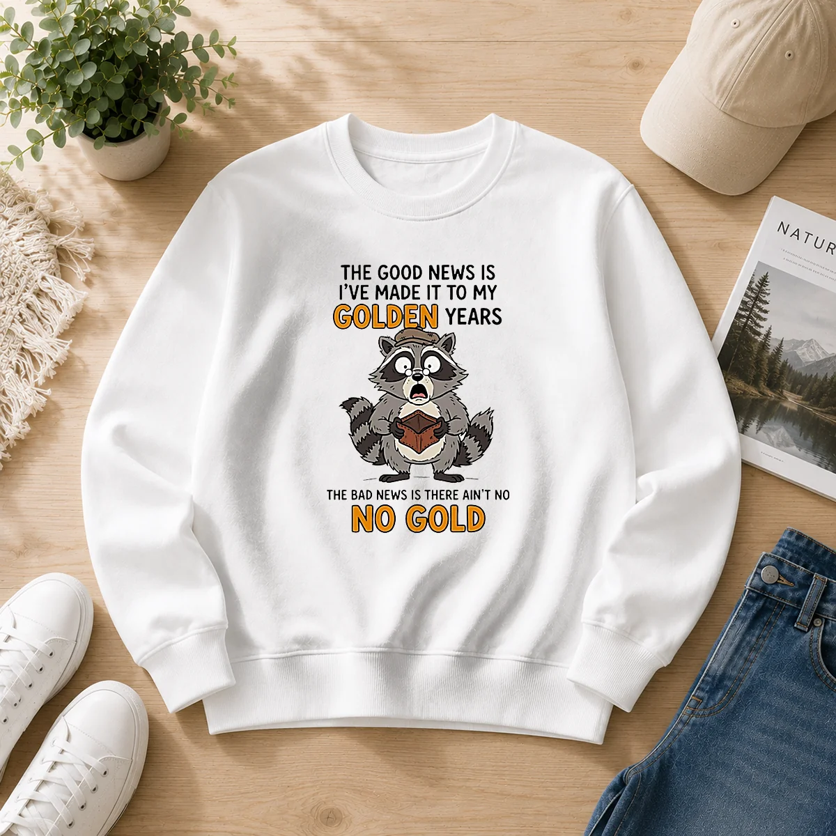 Nice Raccoon The Good News Is Ive Made It To My Golden Years The Bad News Is There Aint No No G cozy sweater with printed text on front
