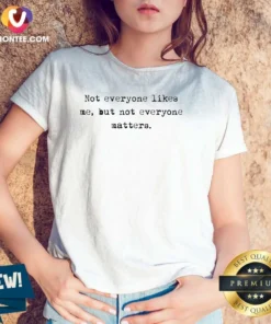 Premium Not Everyone Likes Me But Not Everyone Matters V Neck Shirt in dark color with clear white text design